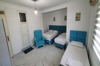 Fethiye Merkez'de Yarım Pansiyon 4 KİŞİLİK AİLE ODASI 